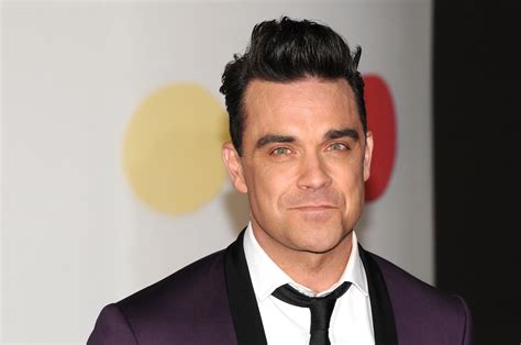 Unlocking the mystery: Is Robbie Williams under a magical spell?